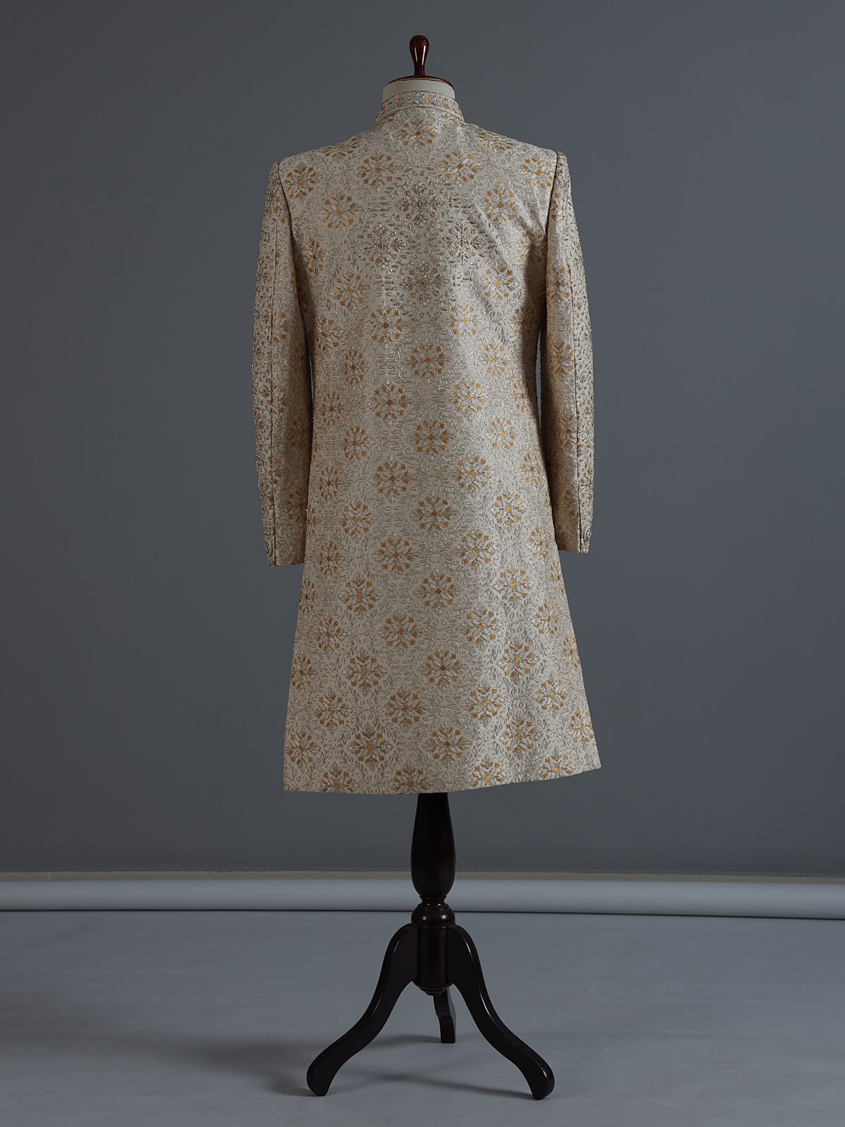 Beige silk sherwani with rich resham and zardosi accents