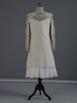 Cream raw silk sherwani with regal zardosi and sequins work