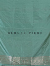Green banarasi silk saree crafted for festive occasions