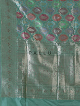 Green banarasi silk saree crafted for festive occasions