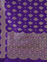 Purple banarasi silk saree with intricate zari work for weddings