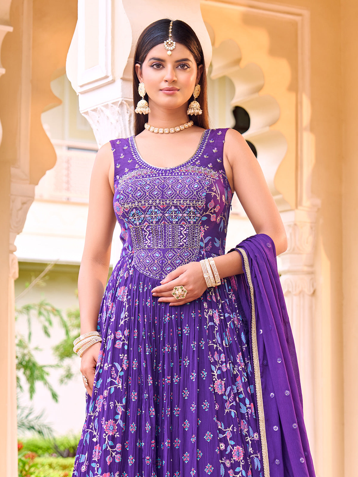 Purple chiffon georgette anarkali suit with stone work
