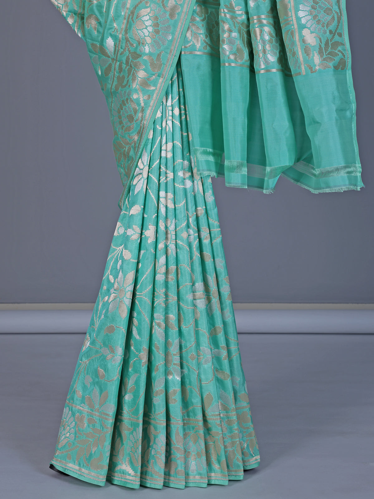 Mint green banarasi silk saree with classic zari detailing