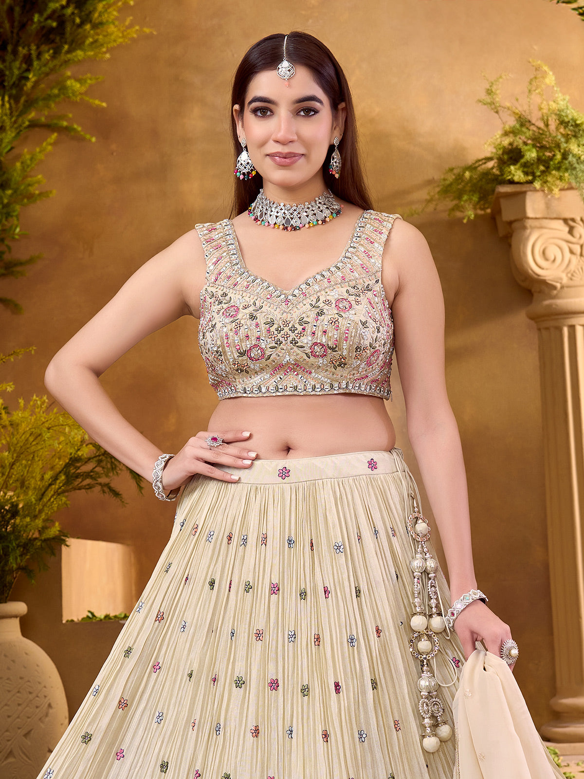 Cream silk lehenga choli with classic zardosi detailing