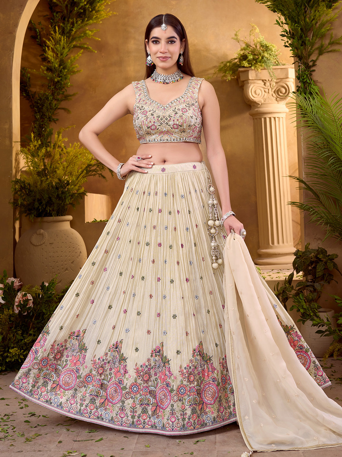 Cream silk lehenga choli with classic zardosi detailing