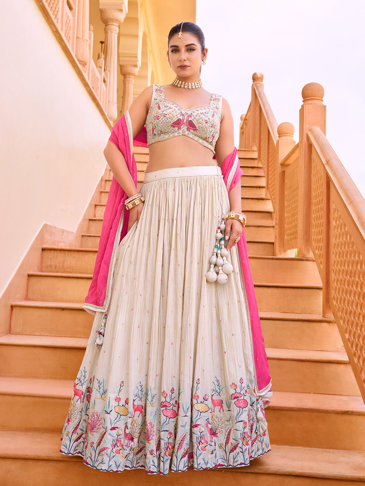 Off white chiffon lehenga choli with animal motifs