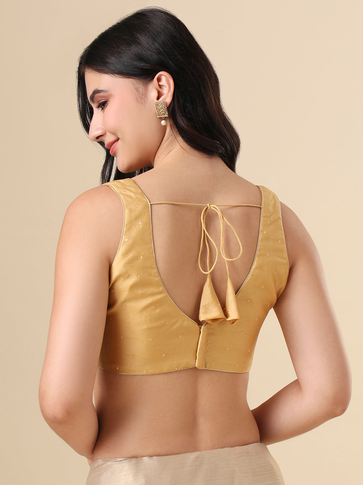 Gold taffeta silk zari woven blouse with elegant sleeveless style
