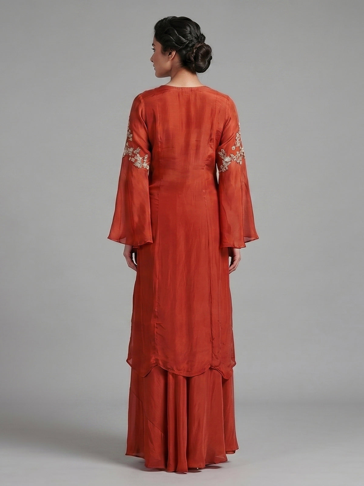 Orange crepe silk indowestern suit with detailed work