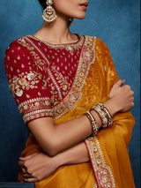 Mustard yellow tissue silk saree for wedding celebrations