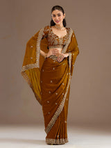 Gold tissue saree with cutdana and sequins work