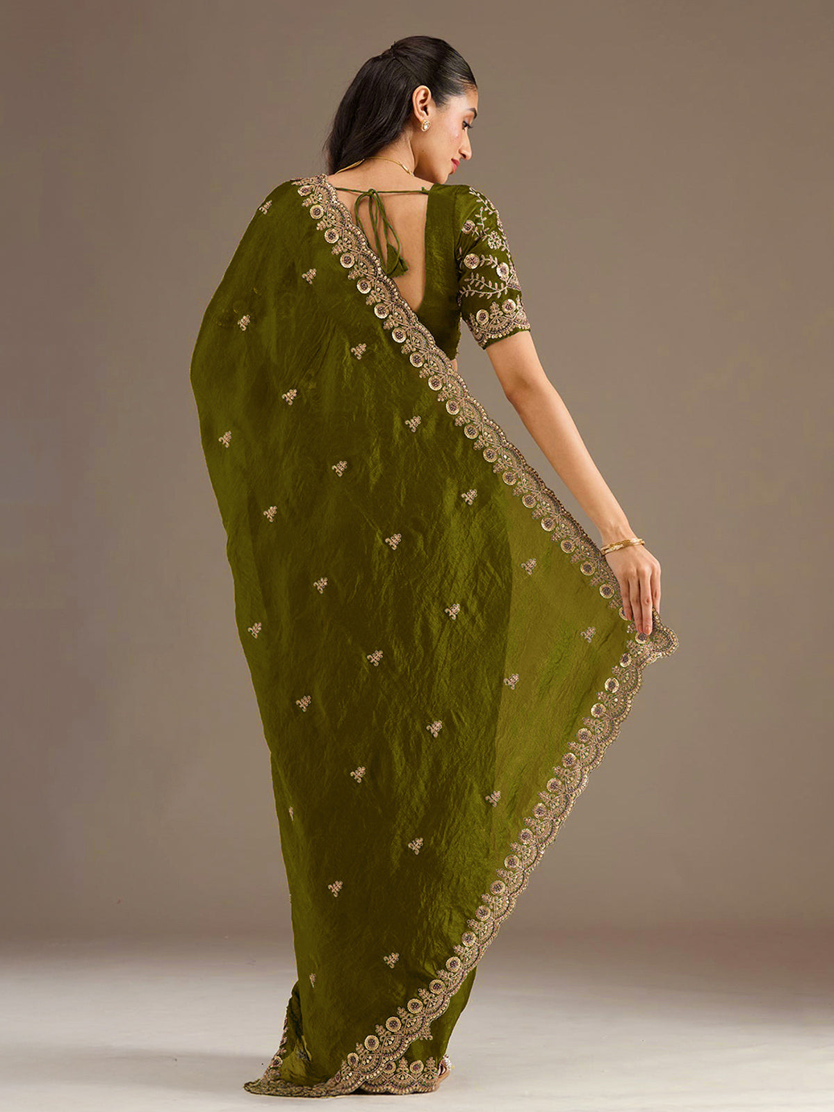 Olive green tissue saree with embellished border