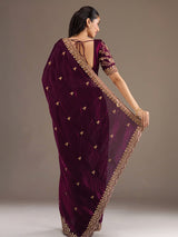Wine party wear tissue saree with embellished border