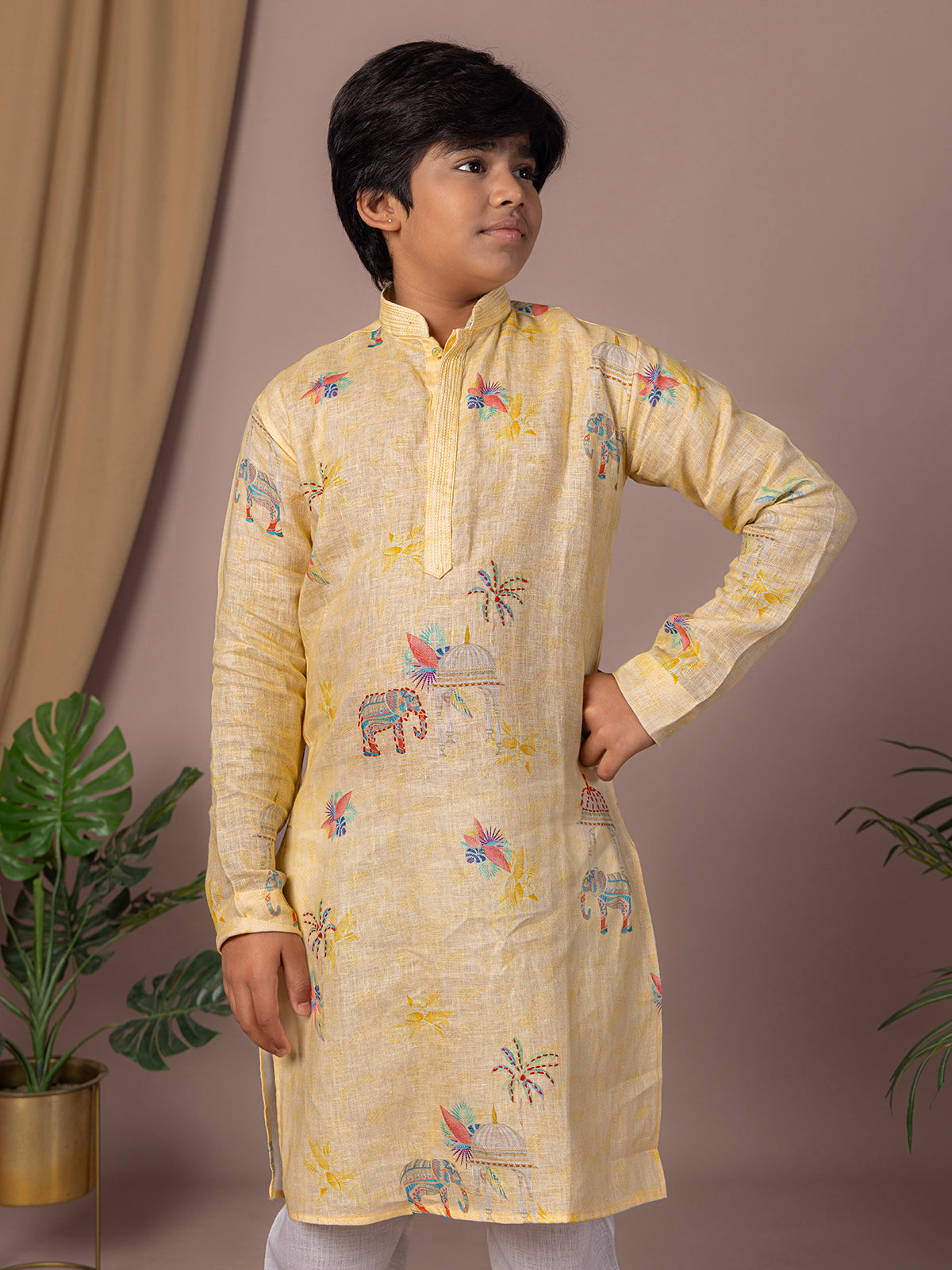 Light yellow kurta suit with thread work print