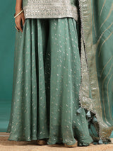 Graceful sage green sharara set with detailed work