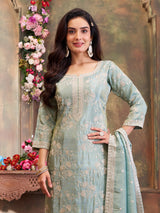 Mint green silk straight suit with graceful detailing