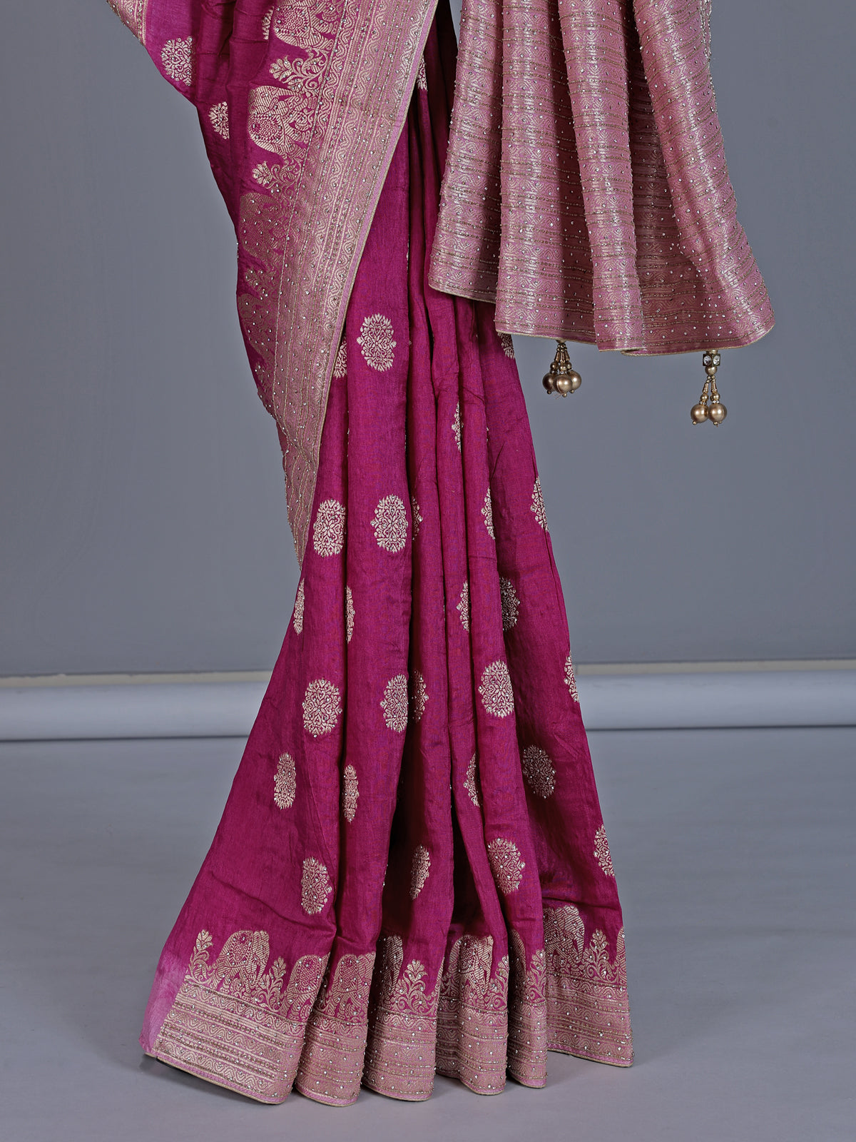 Bright wine dola silk saree with elephant motif elegance