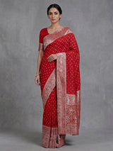 Red dola silk saree with elegant zari butti detailing