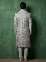 Light grey silk sherwani with elephant motif elegance