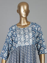 Blue printed cotton kurti designed with worked yoke pattern