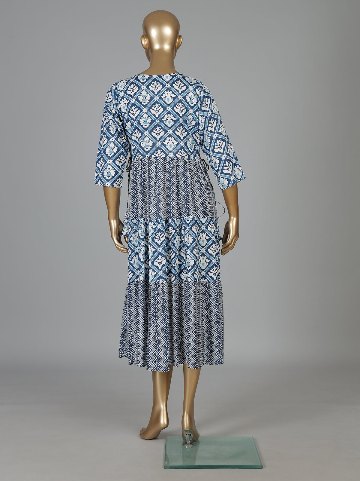 Blue printed cotton kurti designed with worked yoke pattern