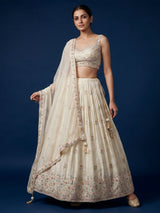 Cream silk lehenga choli with delicate embroidery