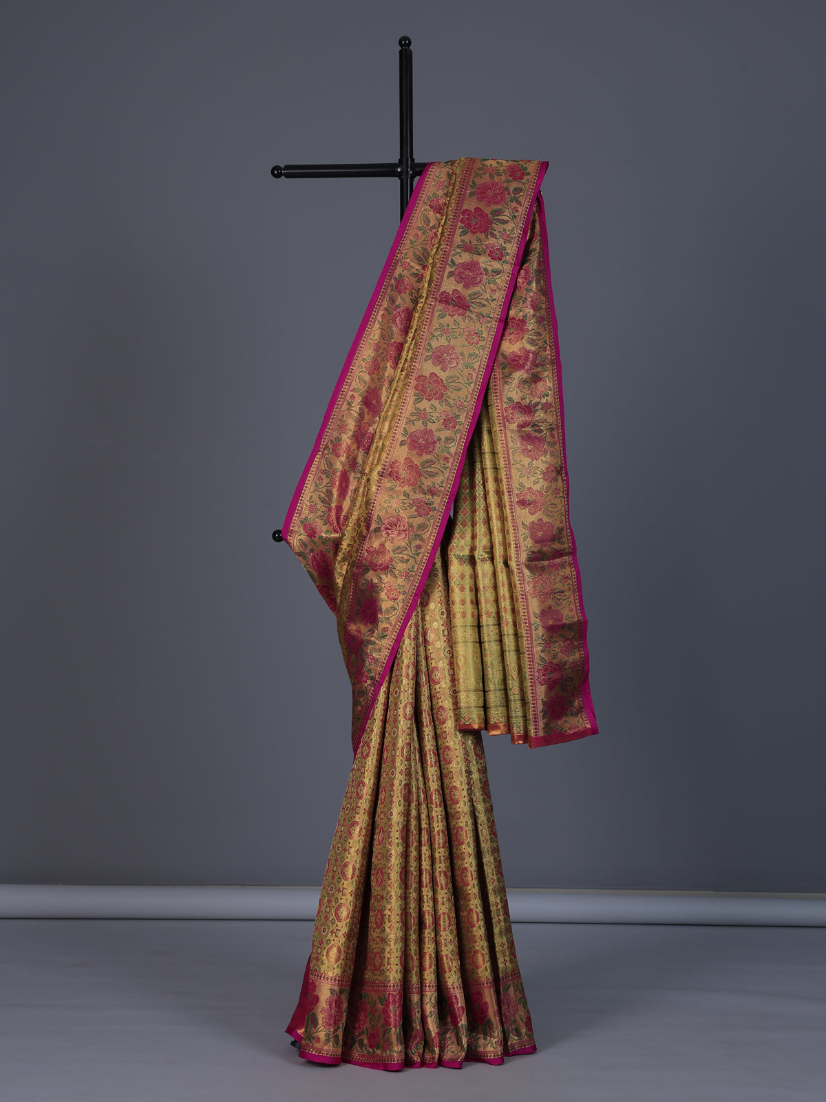 Golden Kanjivaram silk saree with floral motifs