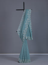 Firozi blue crushed tissue saree with radiant sequins elegance