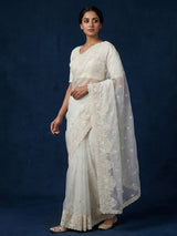 White organza tissue saree with graceful embroidered festive elegance