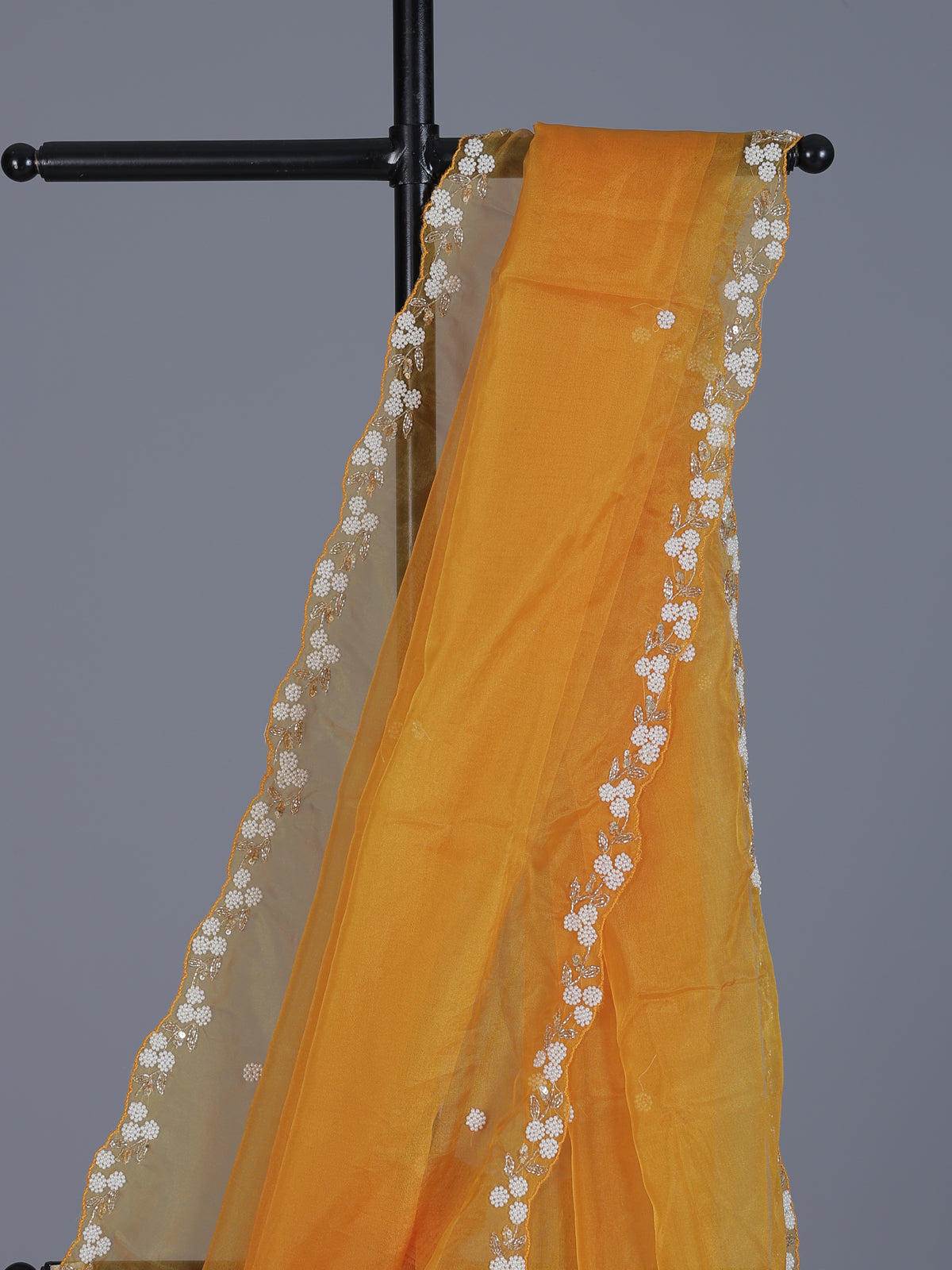 Mustard yellow organza tissue saree with festive sequins shimmer