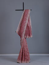Onion pink tissue silk saree with shimmering festive elegance