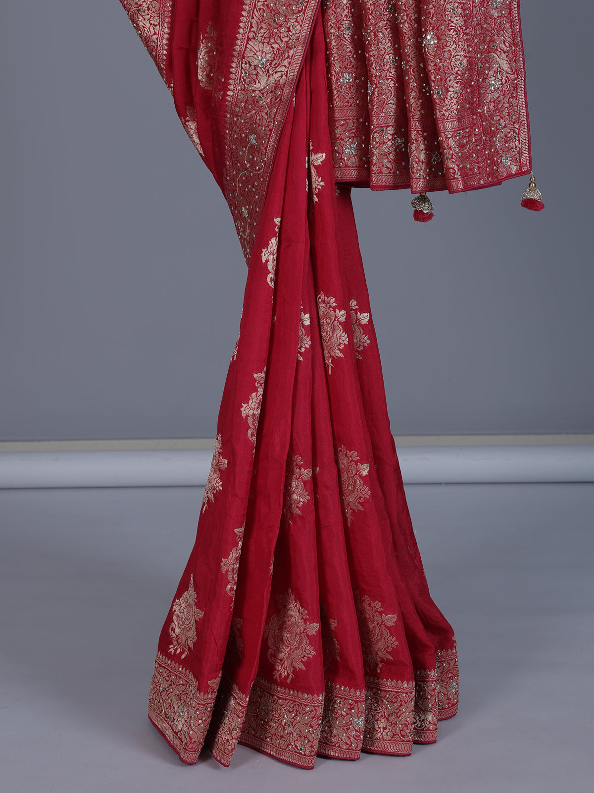 Red silk saree with zari stone and cutdana work
