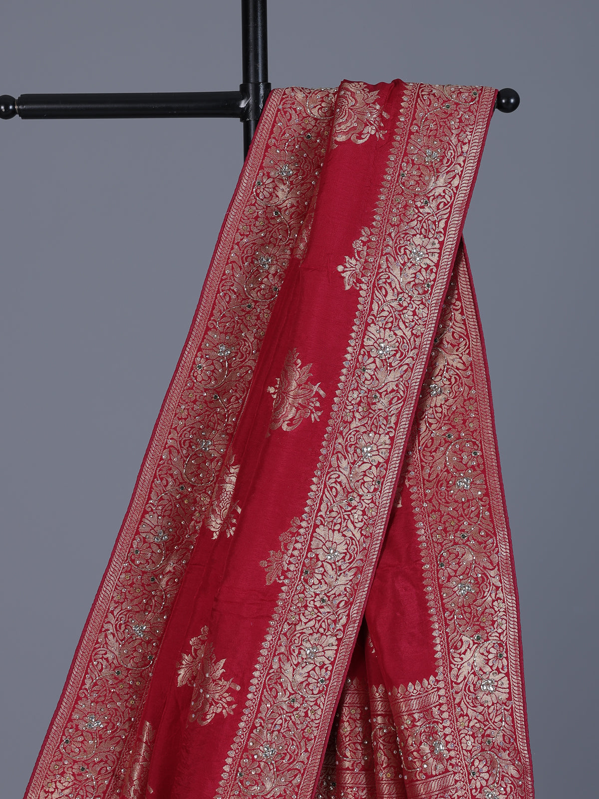 Red silk saree with zari stone and cutdana work