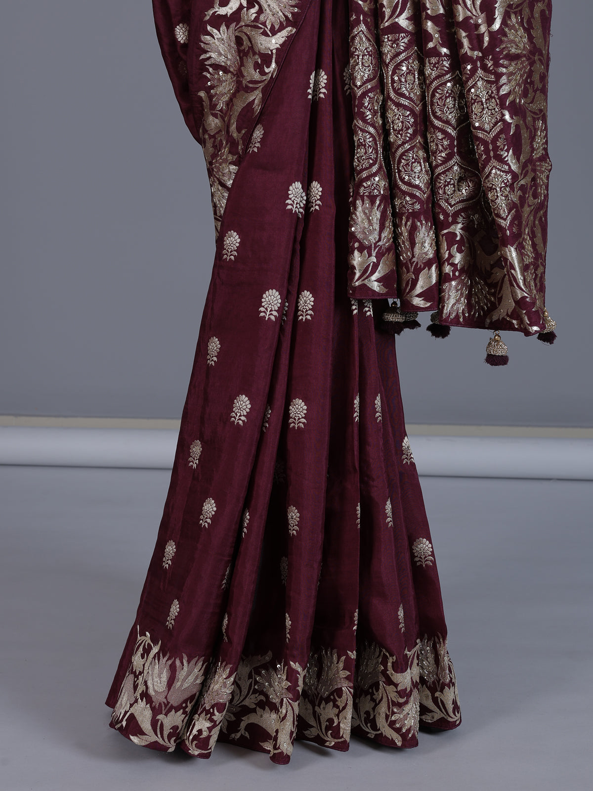 Maroon banarasi silk wedding saree with over all zari detailing