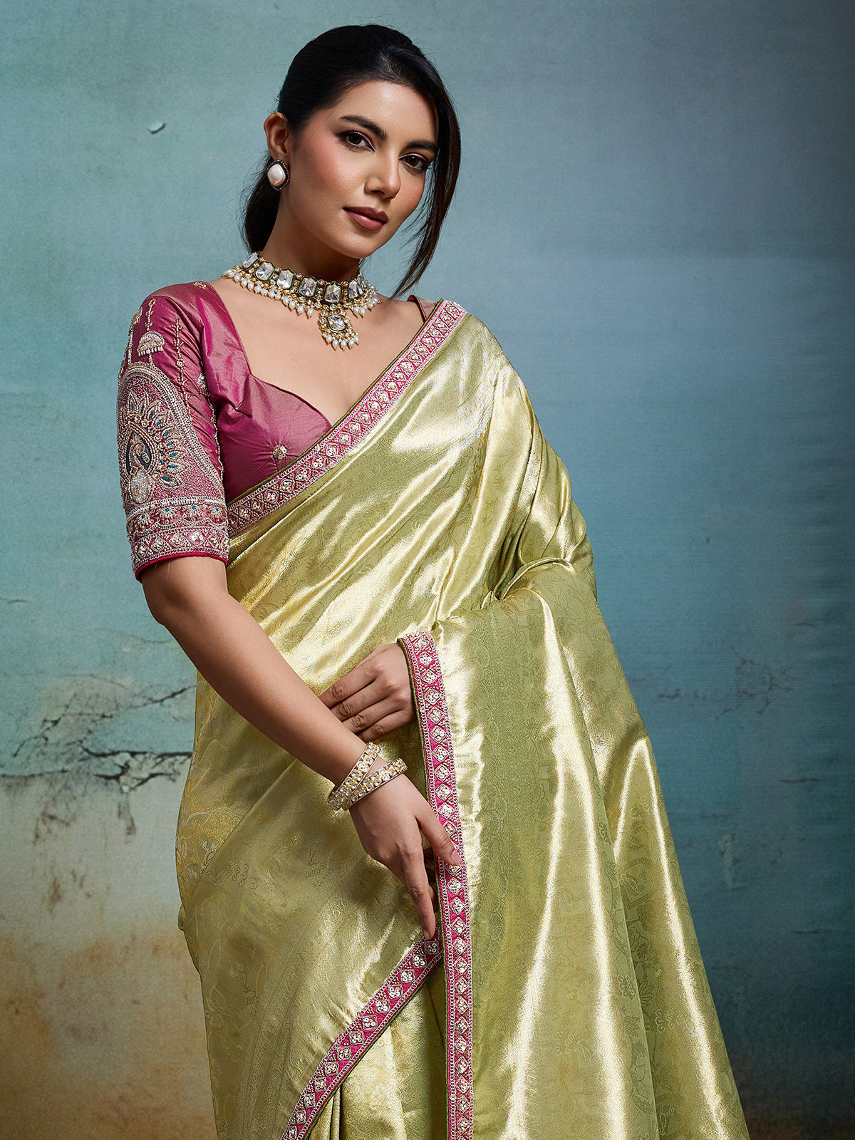 Elegant green metallic tissue silk saree