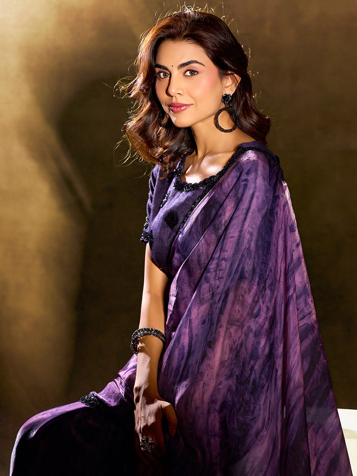 Sophisticated purple abstract satin saree
