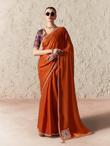 Majestic rust orange festive saree