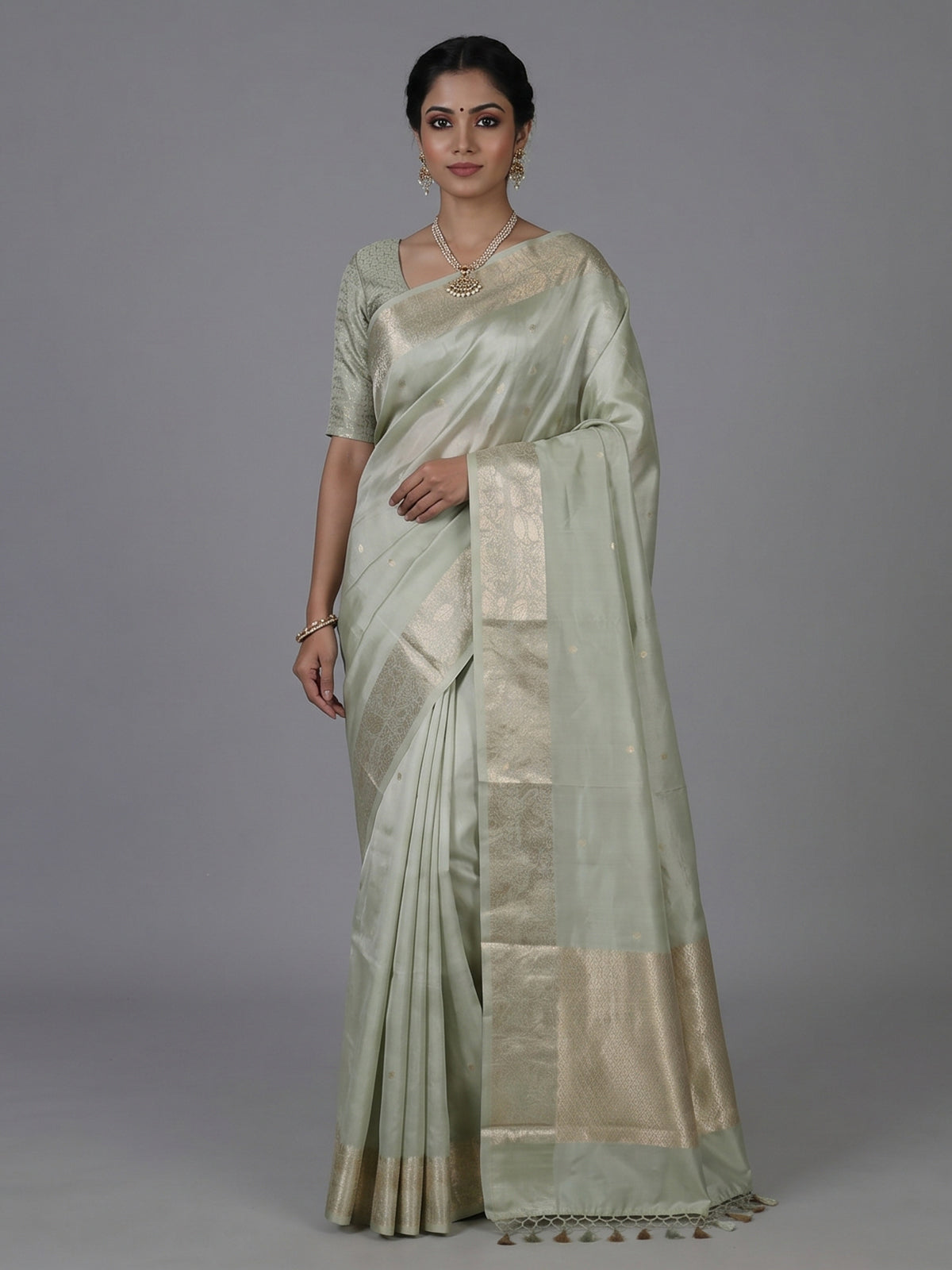 Pista green timeless raw silk  zari celebration saree