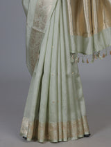Pista green timeless raw silk  zari celebration saree