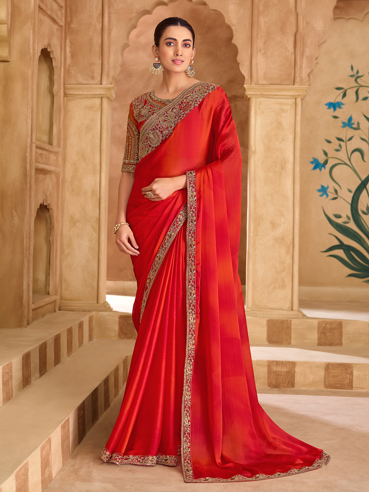 Orange radiant embroidered satin chiffon saree elegance