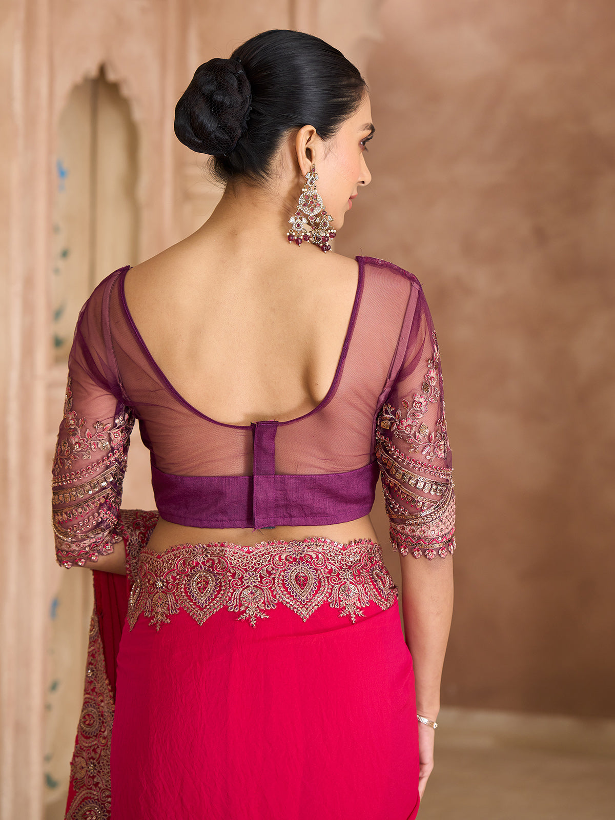 Cherry red luxurious zari wedding saree statement
