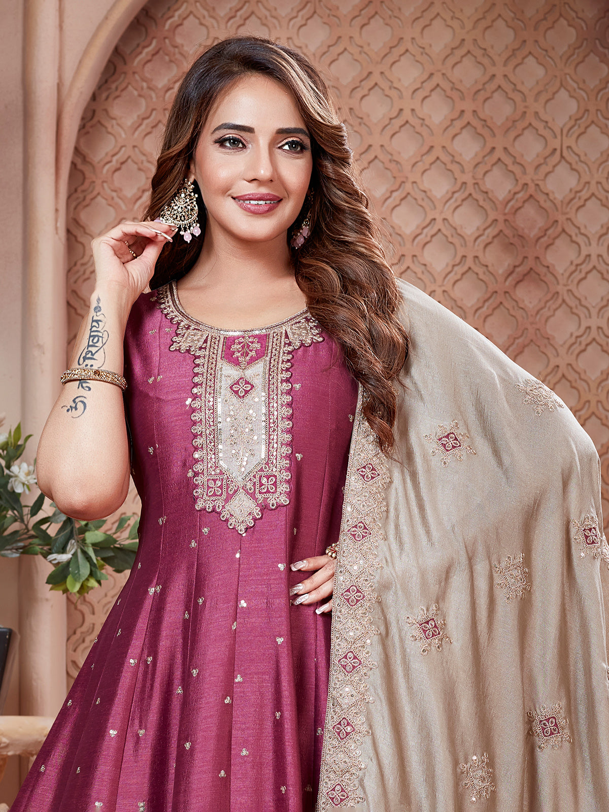 Onion pink sleeveless silk salwar suit for festive celebration
