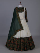 Dark green patola inspired lehenga festive splendor