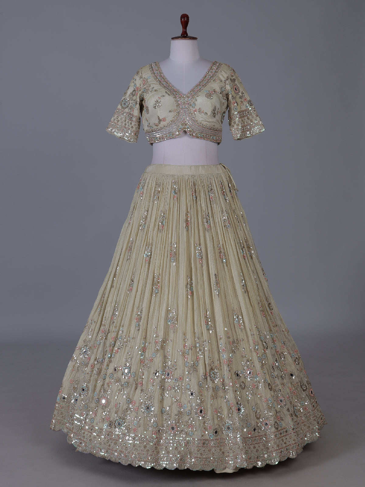 Cream scalloped masterpiece lehenga with royal elegance