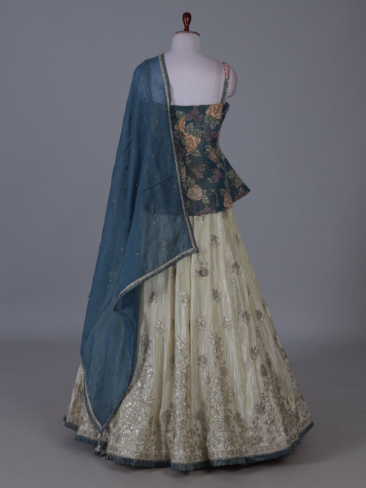 Cream teal blossom peplum lehenga wedding splendor