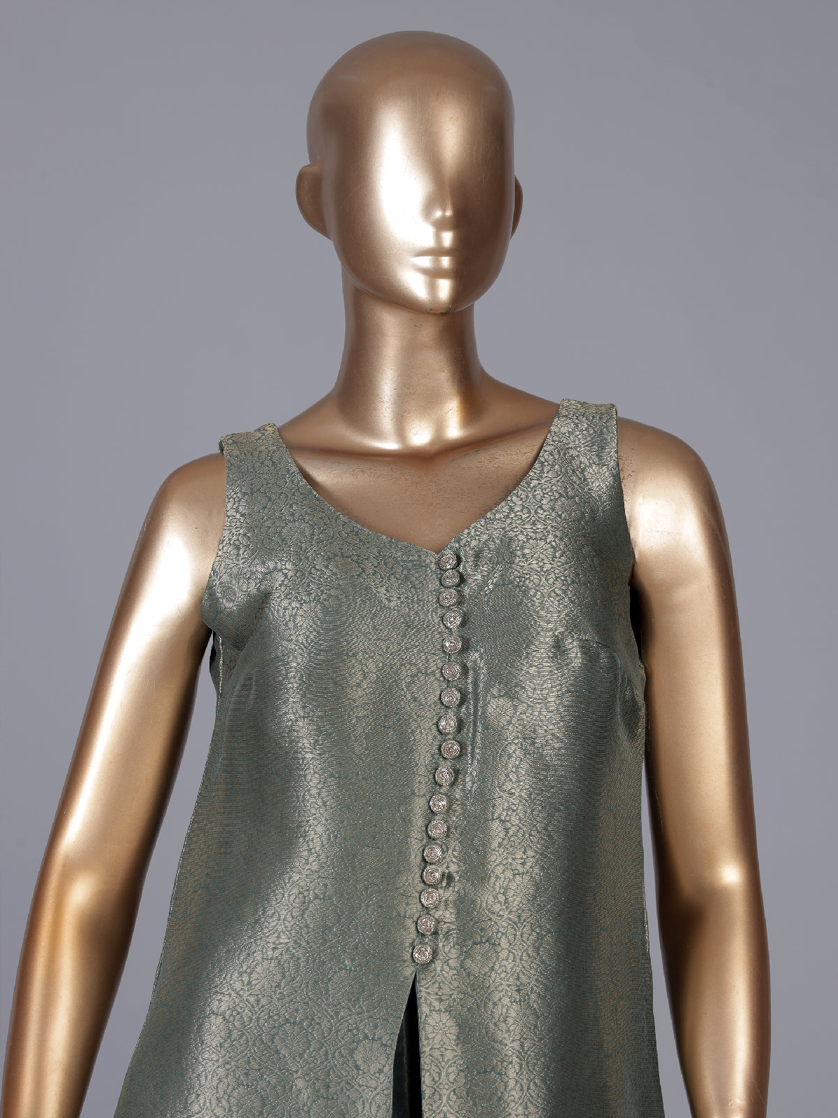 Green metallic brocade salwar suit with front-slit kameez