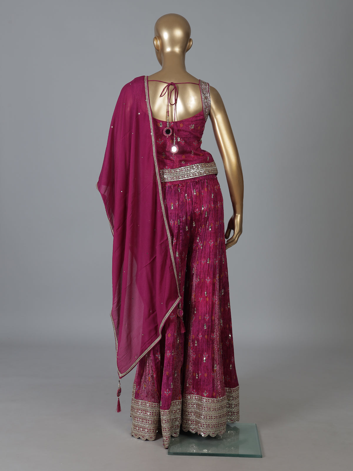 Purple silk palazzo suit with intricate detailing
