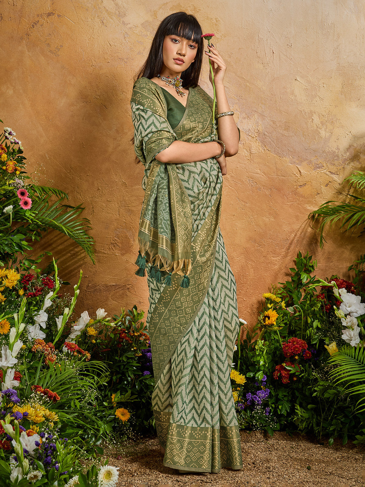 Green vibrant printed zari festive saree elegance