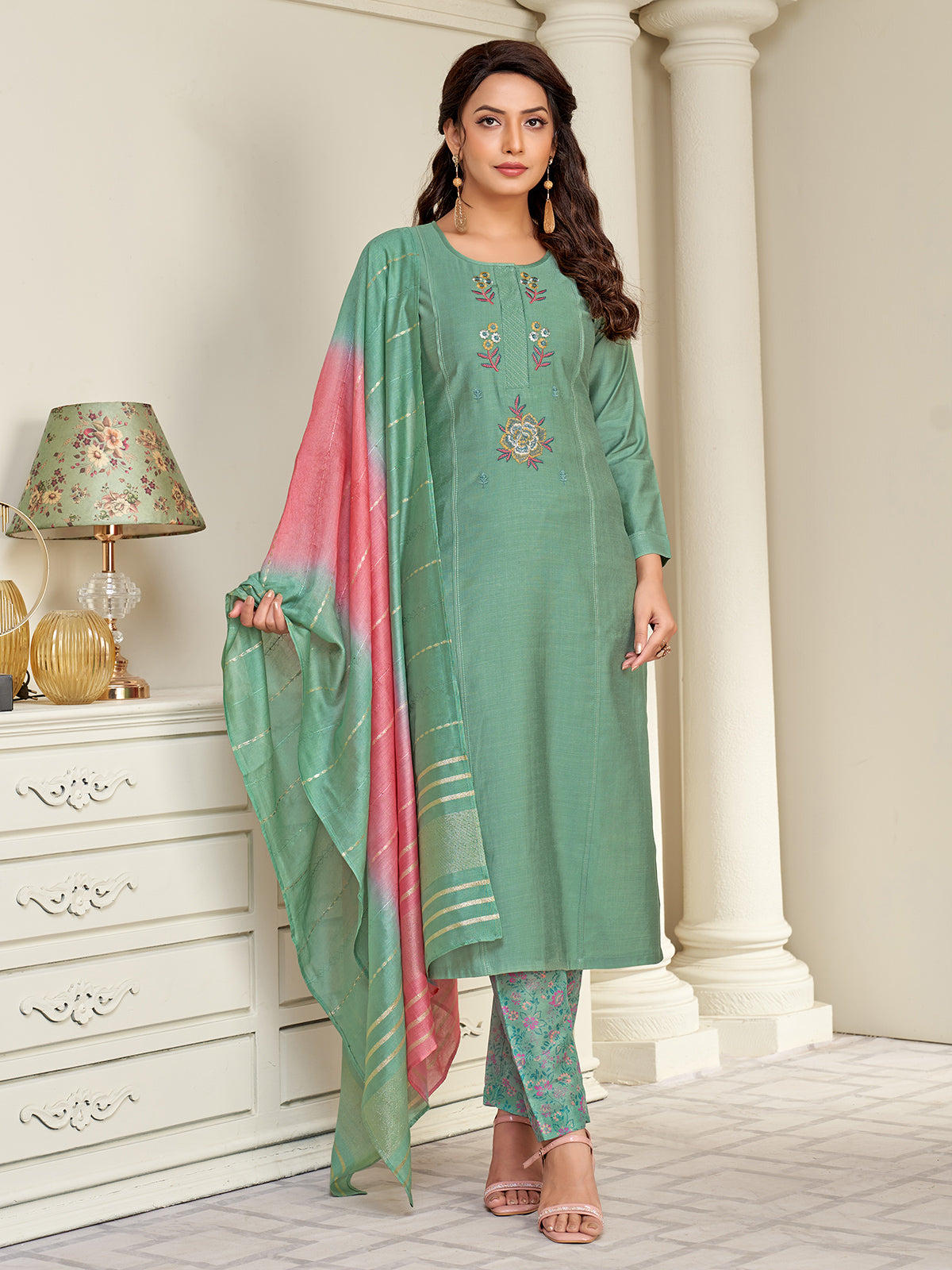 Green silk salwar suit with embroidered detailing