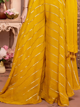 Yellow silk palazzo suit with rich embellish choli