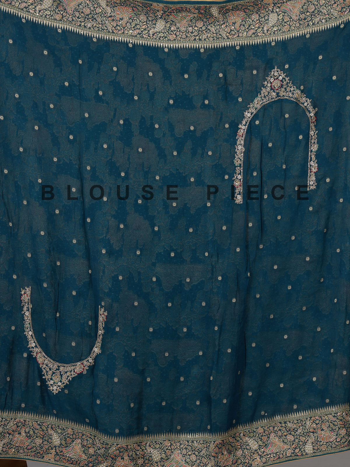 Teal green dola silk saree with royal motifs